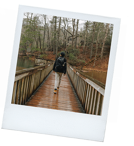 Person walking on a bridge